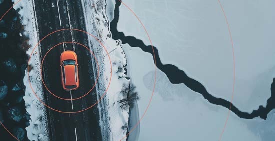 Aerial view of a car on a winter road, with concentric signal rings radiating from it